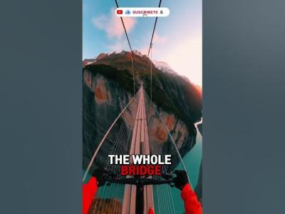 POV Mountain Biker Crosses Insane Suspension Bridge in the Swiss Alps  4K Adrenaline Ride