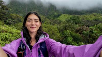solo hiking in a rainstorm with waterfalls