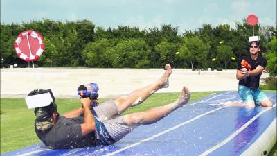 Nerf Slip and Slide Battle  Dude Perfect