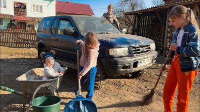 Spring in the Carpathian Mountains One day in the life of a young mother of three small children 